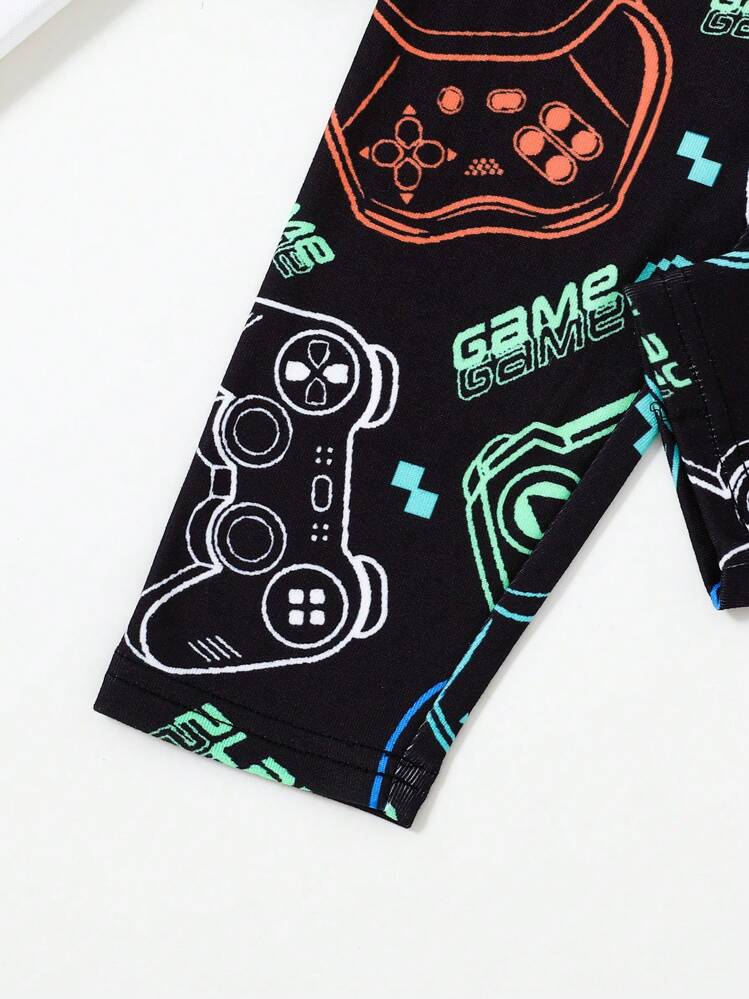SHEIN Set de 2 piezas de pijama de manga larga y ajustado con diseño de control de juego fluorescente y cuello redondo para niño preadolescente - Multicolor - Añade 4