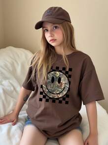 SHEIN Maglietta basic a maniche corte con girocollo per ragazze pre-adolescenti, con stampe grafiche a quadri, floreali e facce spaventose, abiti coordinati/abbinati (venduti separatamente in 2 pezzi)