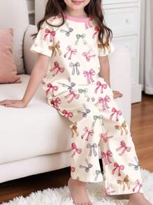 SHEIN 年轻女孩休闲简约粉色蝴蝶结图案圆领短袖 T 恤和宽松长裤家居服套装，适合春夏季