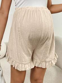SHEIN Pantalones cortos de maternidad informales y versátiles de unicolor con volante en la cintura