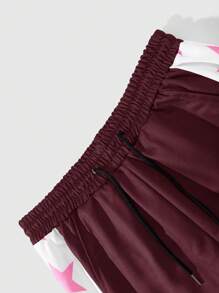 Manfinity Streetrush Pantalón de chándal informal con estampado de estrella y cordón delantero marca Manfinity Streetrush, diseño minimalista para uso diario, pantalón de chándal con elemento de estrella para hombres, regalo para novio