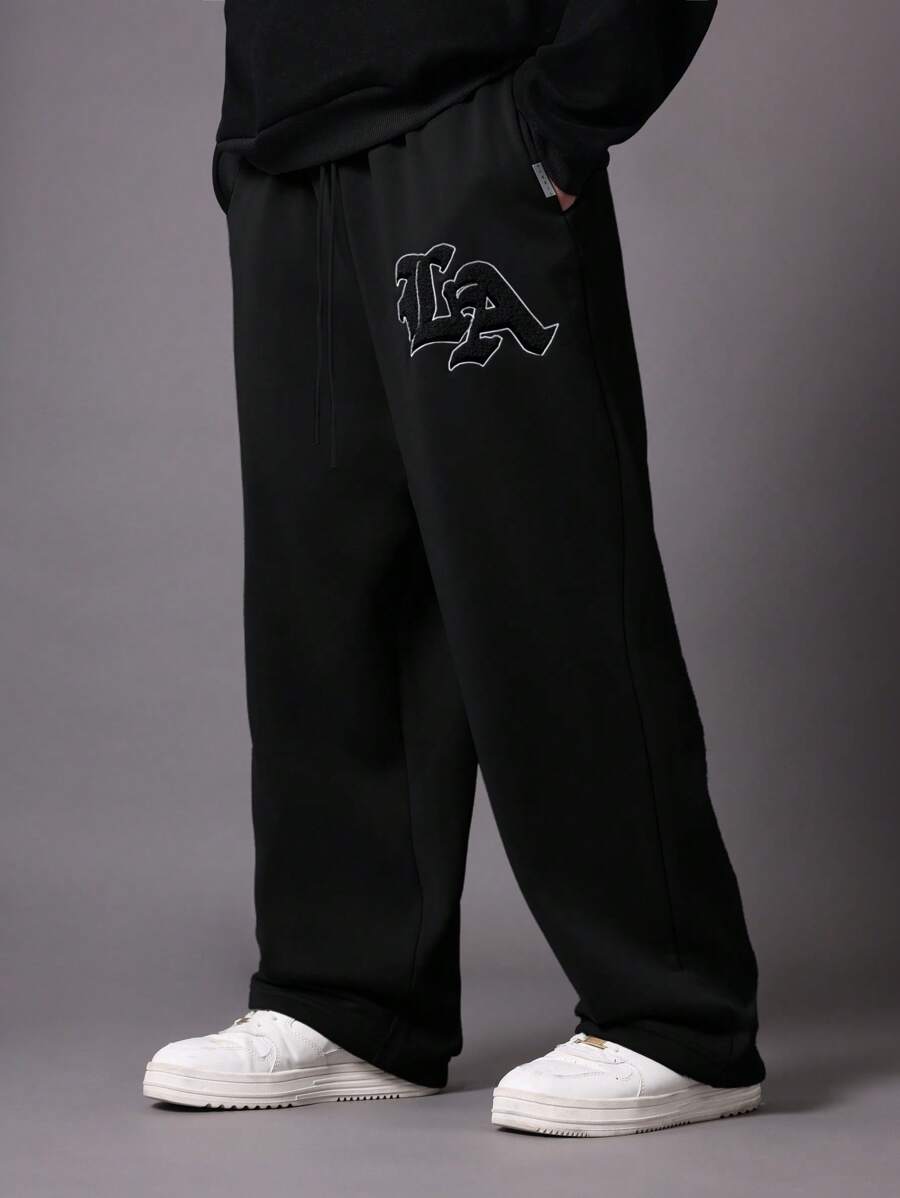 SUMWON 低裆慢跑运动裤优质羊毛街头运动裤，带刺绣标志弹性袖口，舒适休闲冬季运动服训练裤休闲都市风格 - 黑色 - 查看 1