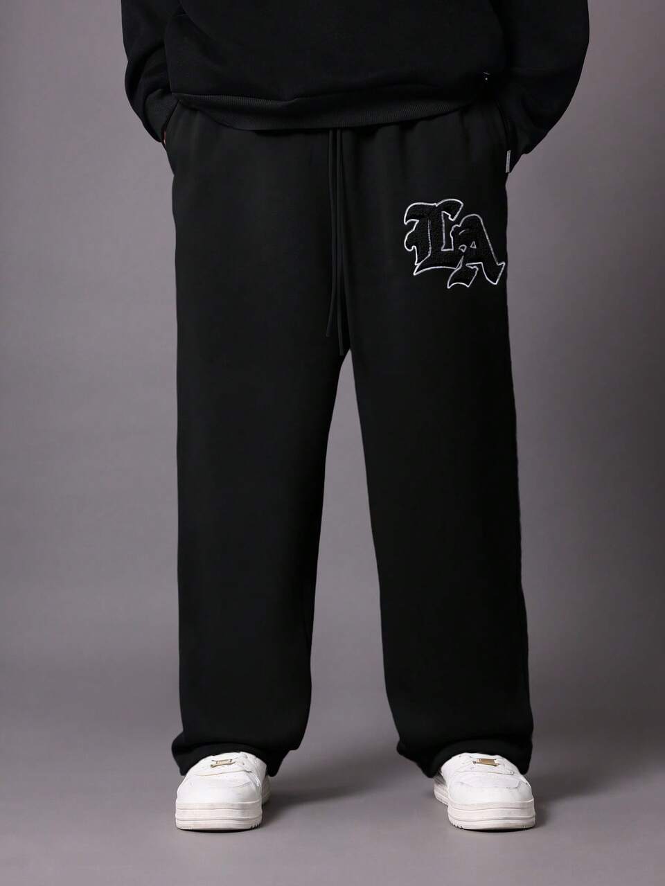 SUMWON Pantalon de jogging à entre-jambe tombante en molleton, pantalon de détente avec logo brodé, poignets élastiques, confort d'hiver, style urbain décontracté