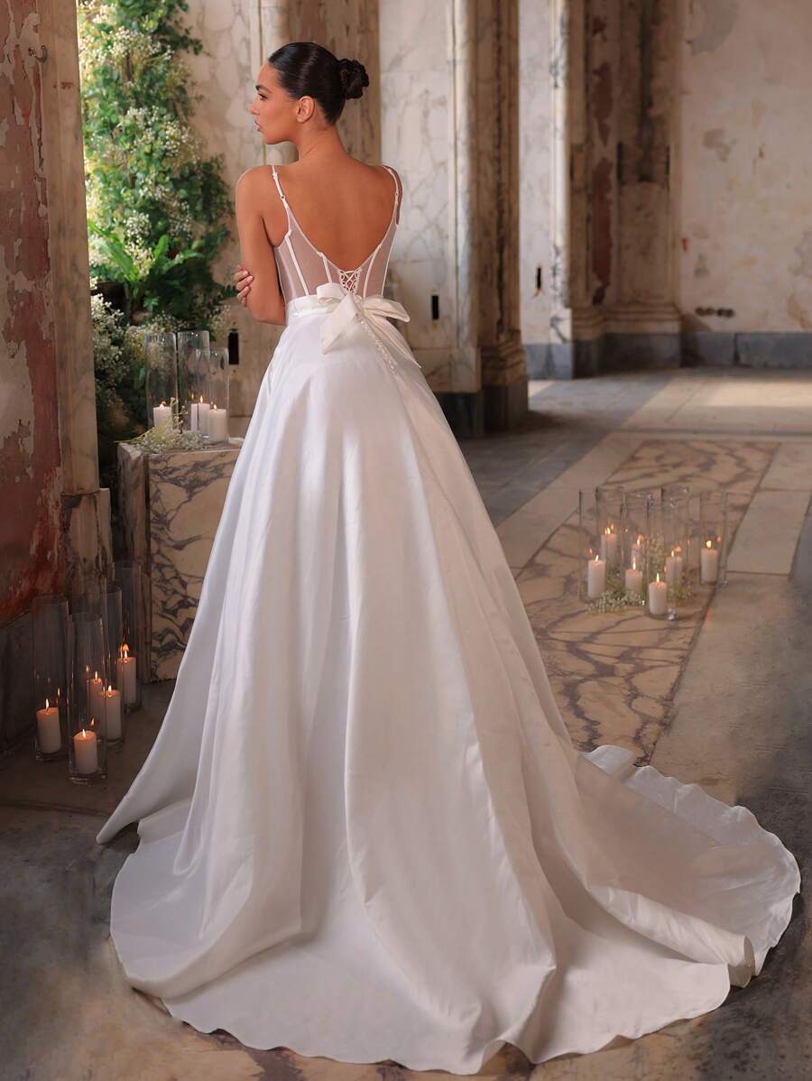 Glamrae Elegant White Satin Backless Dress With Sheer Mesh Panels, Adjustable Tie Shoulder Straps, Large Back Bow, Side Pockets, And Voluminous A-Line With Long Train, Bridal Gown, Wedding Dress, Bride - White - View 1