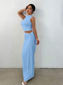 Flirla Set de 2 piezas con camiseta corta con twist en la espalda y falda, elegante