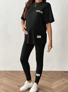 SHEIN 2 件套：孕妇休闲字母印花圆领落肩宽松 T 恤和紧身裤 - 黑色 - 查看 6