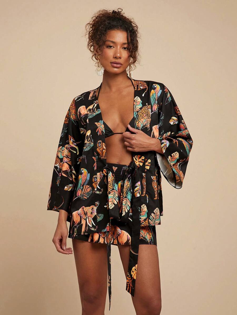 Travachic 女士度假优雅动物印花宽松 V 领系带衬衫