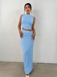 Flirla Set de 2 piezas con camiseta corta con twist en la espalda y falda, elegante