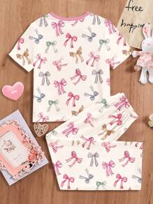 SHEIN 年轻女孩休闲简约粉色蝴蝶结图案圆领短袖 T 恤和宽松长裤家居服套装，适合春夏季