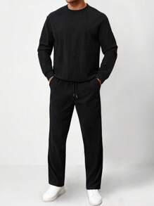 Manfinity Homme Conjunto casual de sudadera de cuello redondo de unicolor de manga larga y pantalón de chándal para hombre