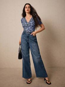 Poéselle 女士花卉印花裹身 V 领短袖修身 T 恤