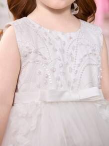 SHEIN Glamorique Kids Vestido de princesa sin mangas de unicolor con lazo en la cintura, falda de tul bordada tipo pastel, adecuado para bodas y fiestas formales