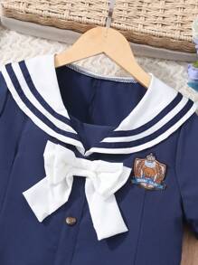 Abito blu navy stile preppy con scollo a V, fiocco e maniche corte per bambine, look carino da divisa scolastica, adatto per primavera/estate