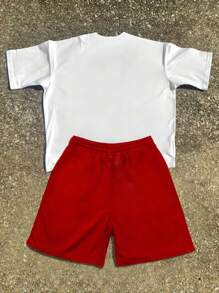Manfinity Streetrush Set de 2 piezas con camiseta de manga corta de cuello redondo con estampado de personaje y pantalones cortos con cordón en la cintura para hombre