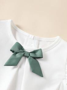 Souflis Souflis Bộ áo hai dây nơ màu tương phản theo phong cách đồng quê kiểu Pháp cho bé gái + quần short họa tiết hoa, dễ thương & giản dị, tươi mát mùa xuân/hè - trắng - Xem 8