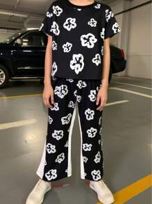 SHEIN Jonge jongens bloemenprint ronde hals korte mouw top en broek casual outfit, geschikt voor dagelijks gebruik