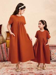 SHEIN Tween Mädchen einfarbiges, strukturiertes Stoffkleid mit kurzen Ärmeln und lockerer A-Linie und Taschen, langes Kleid