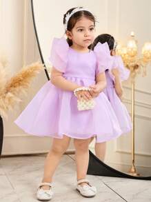 Elegantes kurzes Baby Mädchen Kleid mit Organza Rüschensaum, einfarbig, kurzärmelig, Magenta