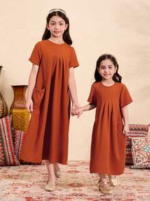 SHEIN Tween Mädchen einfarbiges, strukturiertes Stoffkleid mit kurzen Ärmeln und lockerer A-Linie und Taschen, langes Kleid