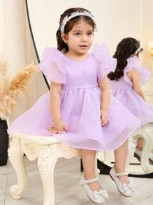 Elegantes kurzes Baby Mädchen Kleid mit Organza Rüschensaum, einfarbig, kurzärmelig, Magenta
