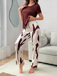 SHEIN Conjunto de pijama de mujer con estampado informal, de manga corta y pantalón