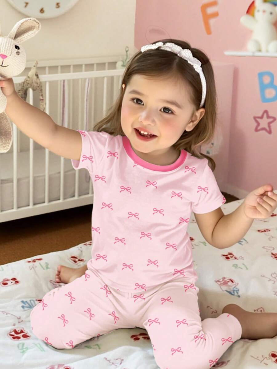 SHEIN 年轻女孩可爱迷你粉色蝴蝶结印花休闲简约紧身圆领短袖 T 恤和紧身打底裤家居服，适合所有季节 - 彩色 - 查看 1