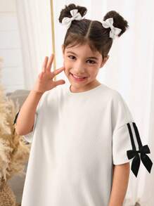SHEIN Vestido camiseta de punto holgado de unicolor con cuello redondo para niña casual