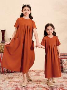 SHEIN Tween Mädchen einfarbiges, strukturiertes Stoffkleid mit kurzen Ärmeln und lockerer A-Linie und Taschen, langes Kleid