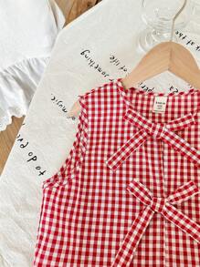 SHEIN Conjunto de 2 piezas de blusa sin mangas con decoración de lazo y dobladillo con volantes a cuadros rojos y blancos, y shorts casuales para niñas preadolescentes, adecuado para primavera/verano, salidas diarias, viajes de primavera, vuelta al colegio
