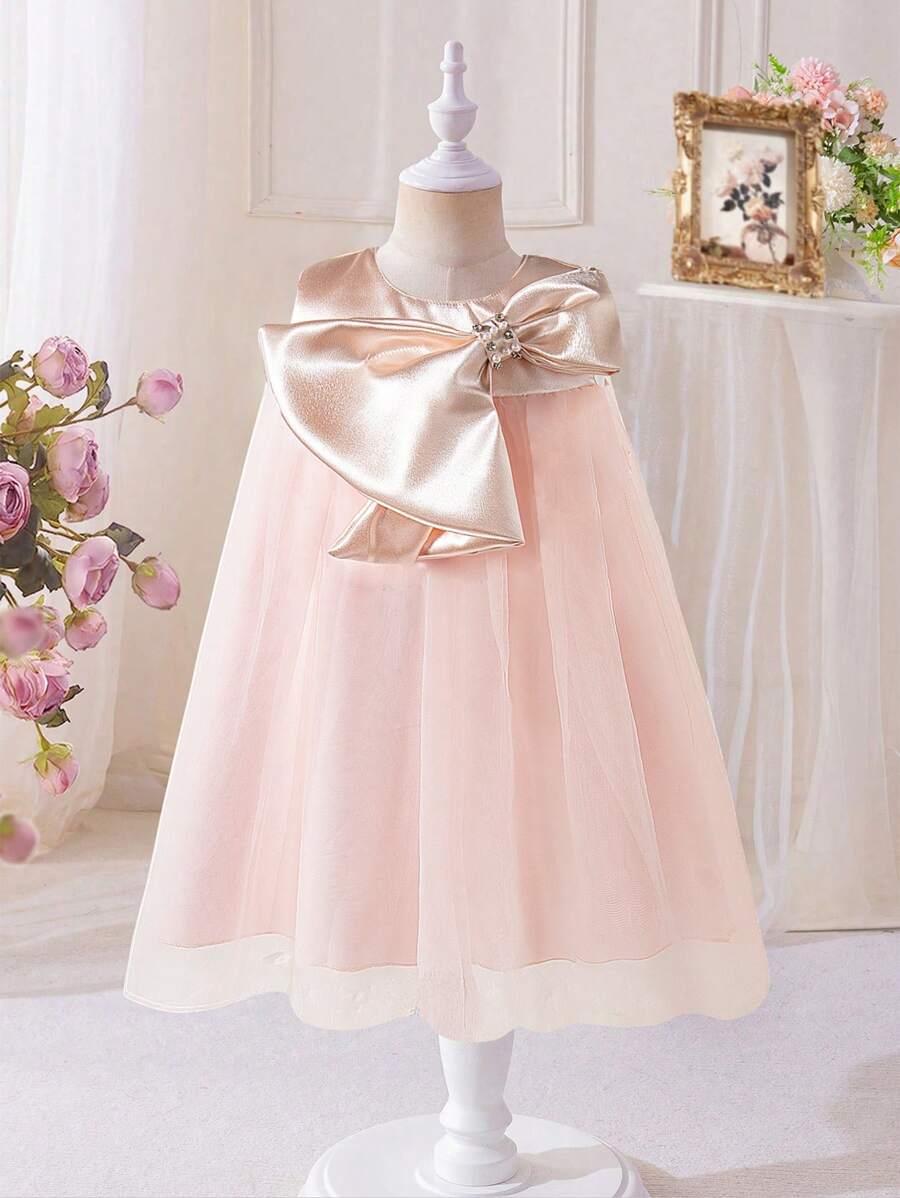 Vestido sem mangas com decote redondo para meninas com laço e emenda de tecido de malha. É uma novidade para a primavera, outono e verão, apresentando um estilo moderno, elegante, doce, fofo e feminino. - Rosa - Ver 1
