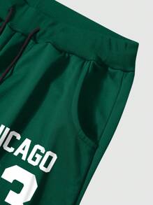 Manfinity Homme Plus Size Heren Letter Bedrukt Trekkoord Taille Zakken Enkelomslag Joggingbroek