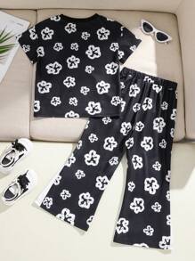SHEIN Jonge jongens bloemenprint ronde hals korte mouw top en broek casual outfit, geschikt voor dagelijks gebruik