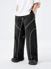 SHEIN Tween Boys 春夏撞色绑带抽绳口袋宽松休闲运动裤，长款街头时尚超大拼色运动裤