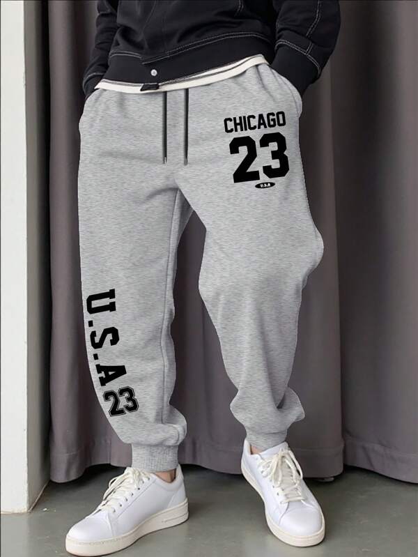 Manfinity Homme Herren Jogginghose in Große Größen mit Buchstabengrafik, Kordelzug in der Taille, Taschen, für Raves