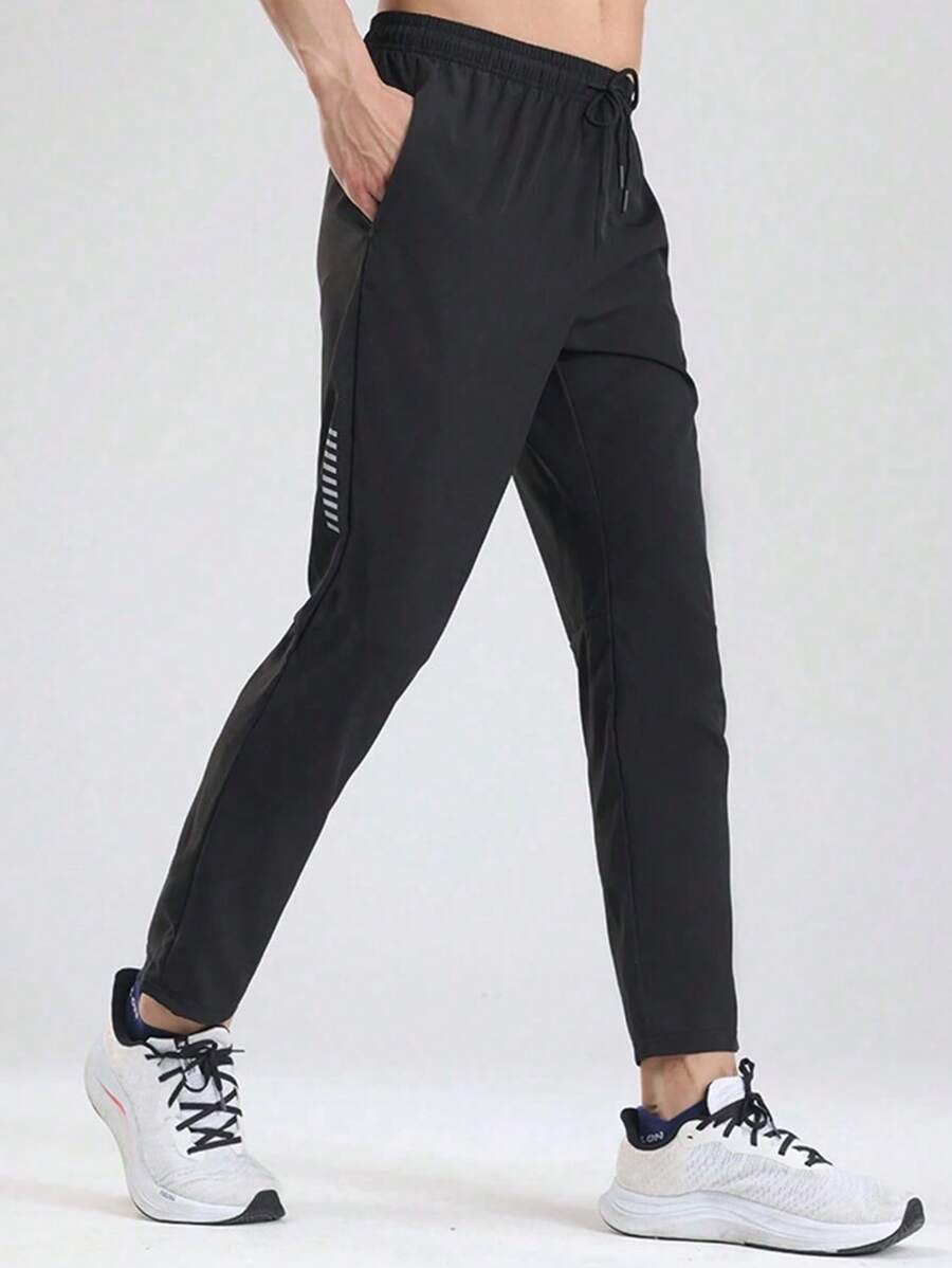 Manfinity Sport Corelite Pantalones deportivos informales con cordón y transpirables para hombres