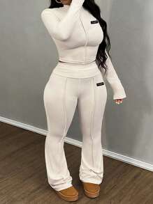 Slaydiva Casual & Basic & Sporty & Daily 2 Pieces Set: Fitted Solid Color Long Sleeve Crop Top With Flared Pants, Textured Ribbed Fabric, Plus Size Women - Apricot - View 1