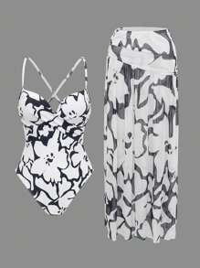 SHEIN Swim 2 pièces Ensemble de maillot de bain : Maillot de bain une pièce avec bretelles spaghetti et nœud push-up, et jupe de plage maxi avec ourlet volant pour tenue de vacances pour femmes - Noir et Blanc - Voir 4