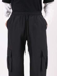 SUMWON Skater Fit Nylon Cargo Pants With Elastic Ankle, Drawstring Waist, Relaxed Fit Streetwear For Winter Sports And Urban Fashion, Versatile Travel Pants - Black - View 7