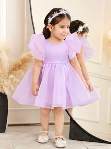 Elegantes kurzes Baby Mädchen Kleid mit Organza Rüschensaum, einfarbig, kurzärmelig, Magenta