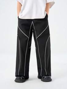 SHEIN Tween Boys 春夏撞色绑带抽绳口袋宽松休闲运动裤，长款街头时尚超大拼色运动裤