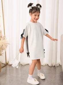 SHEIN Vestido camiseta de punto holgado de unicolor con cuello redondo para niña casual