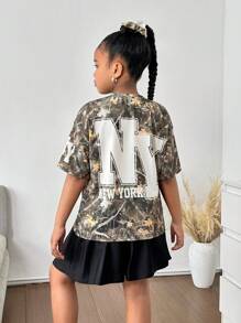 Ensemble 2 pièces pour préadolescentes : T-shirt oversize à imprimé camouflage et lettres + jupe mini plissée noire, retour à l'école, style Y2K, streetwear, chic et doux, style campus américain - Multicolore - Voir 1