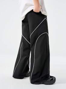 SHEIN Tween Boys 春夏撞色绑带抽绳口袋宽松休闲运动裤，长款街头时尚超大拼色运动裤