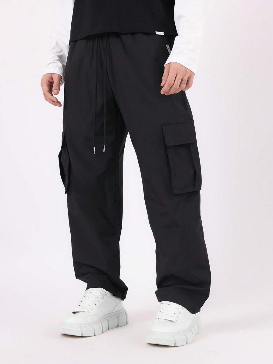 SUMWON Skater Fit Nylon Cargo Pants With Elastic Ankle, Drawstring Waist, Relaxed Fit Streetwear For Winter Sports And Urban Fashion, Versatile Travel Pants - Black - View 1