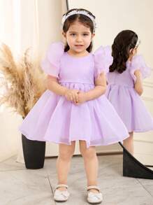 Elegantes kurzes Baby Mädchen Kleid mit Organza Rüschensaum, einfarbig, kurzärmelig, Magenta