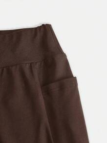 SHEIN Pantalones de yoga con campana para niñas preadolescentes, de cintura alta, ajuste ceñido, elásticos, casuales y versátiles con bolsillo parche