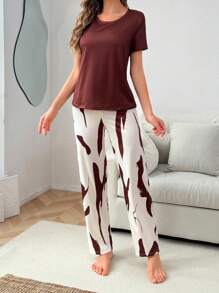 SHEIN Conjunto de pijama de mujer con estampado informal, de manga corta y pantalón