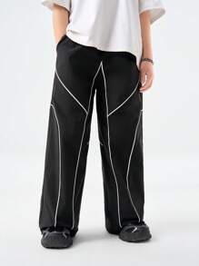 SHEIN Tween Boys 春夏撞色绑带抽绳口袋宽松休闲运动裤，长款街头时尚超大拼色运动裤