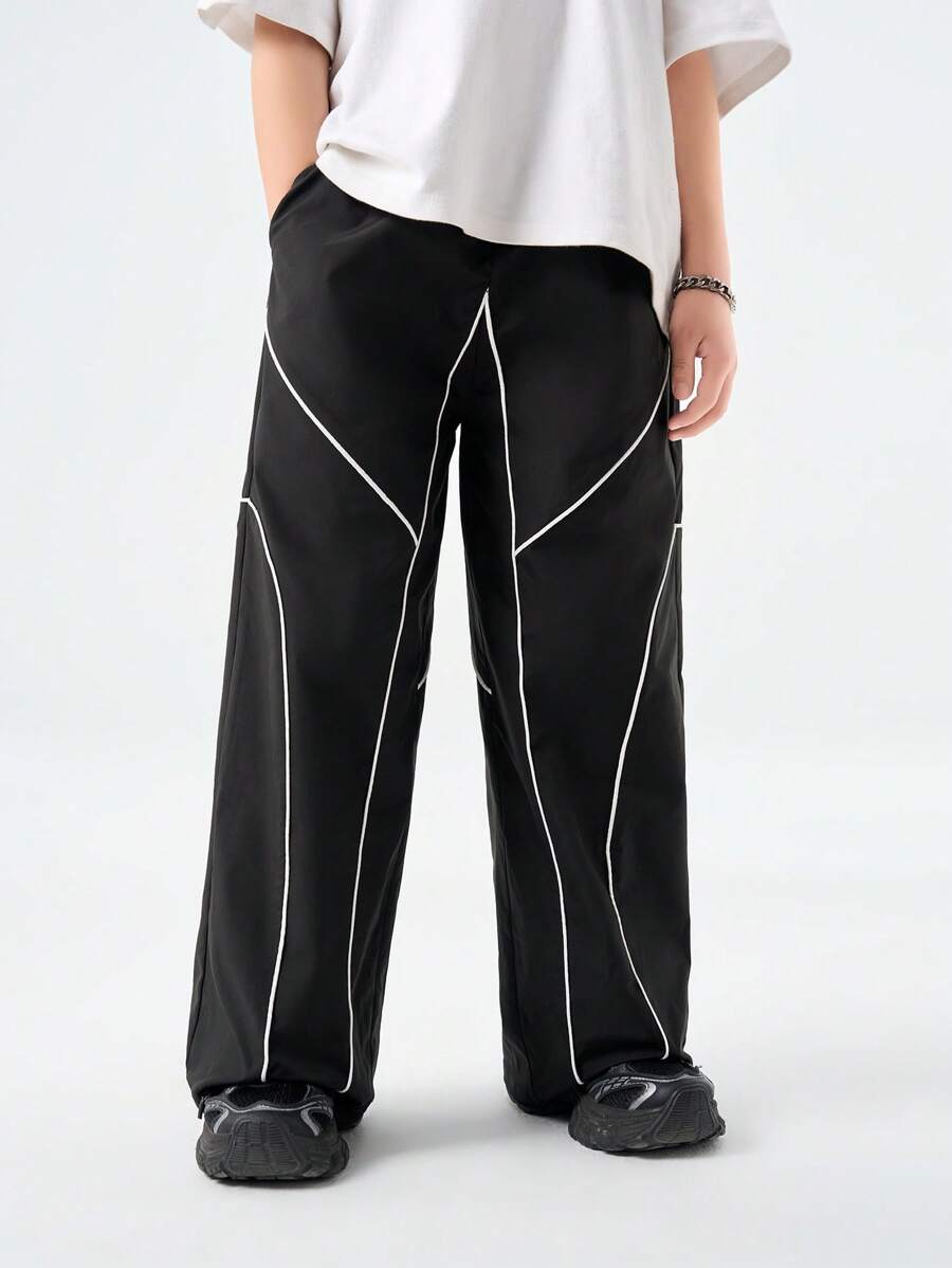 SHEIN Tween Boys 春夏撞色绑带抽绳口袋宽松休闲运动裤，长款街头时尚超大拼色运动裤