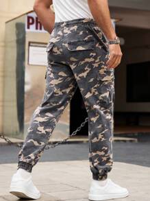 Manfinity Homme Jeans holgados de camuflaje con pierna entallada para hombres